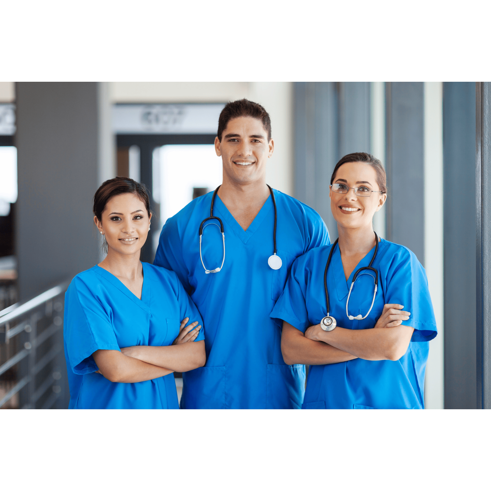 Female and male hair transplant technicians in scrubs in a hospital