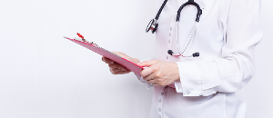 Doctor carrying out a general health-check up.