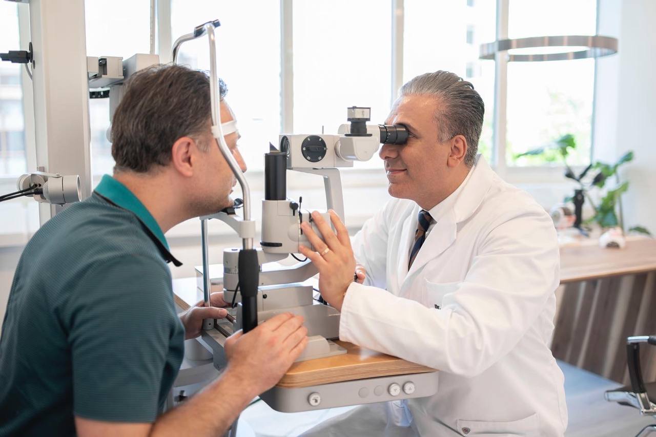 Dr Rafiezadeh Treating a Patient