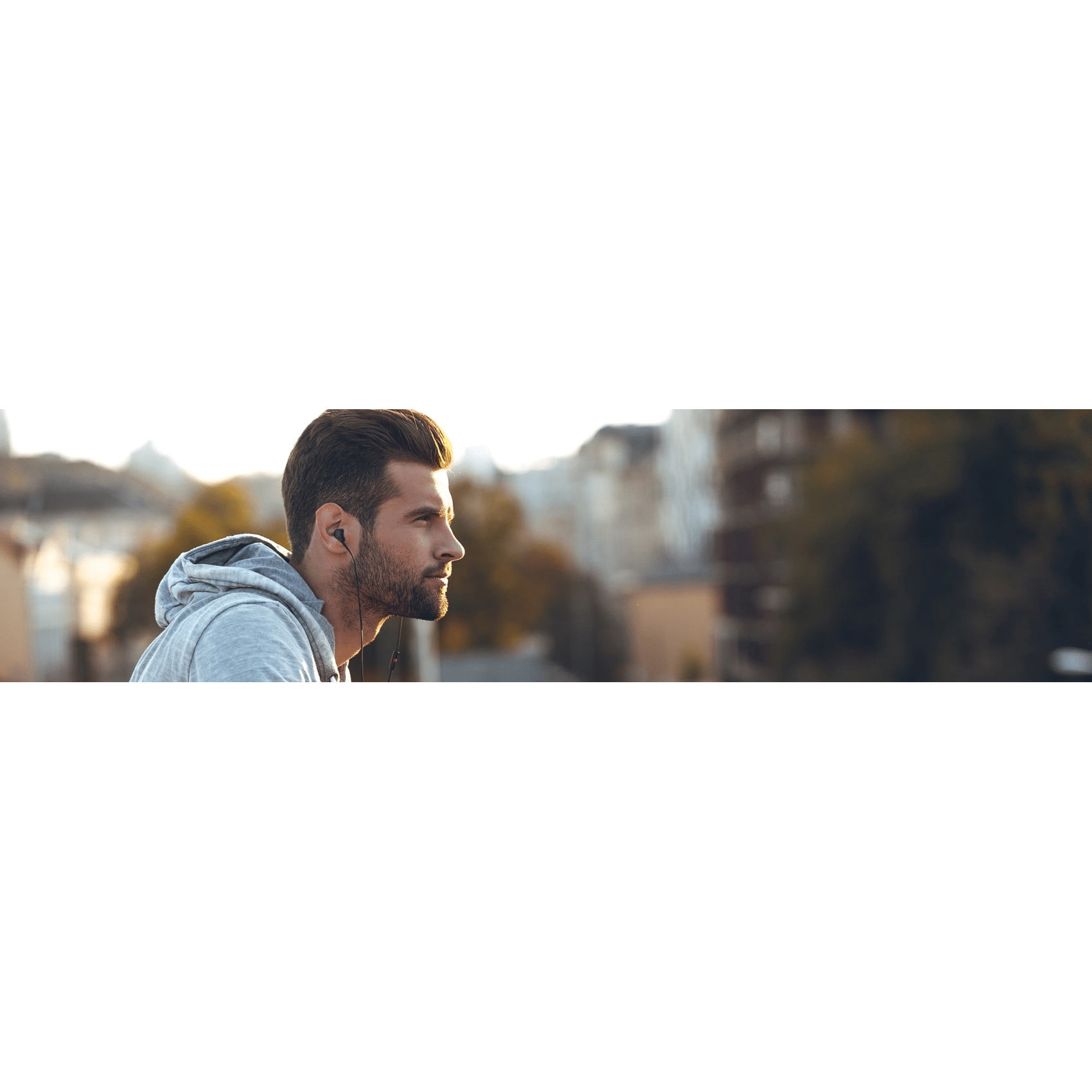 Doctor drawing lines on man's stomach to define areas of treatment for liposuction surgery.