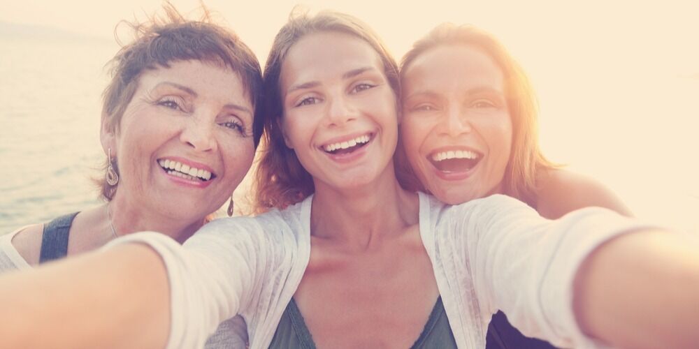 Image of three women with veneers