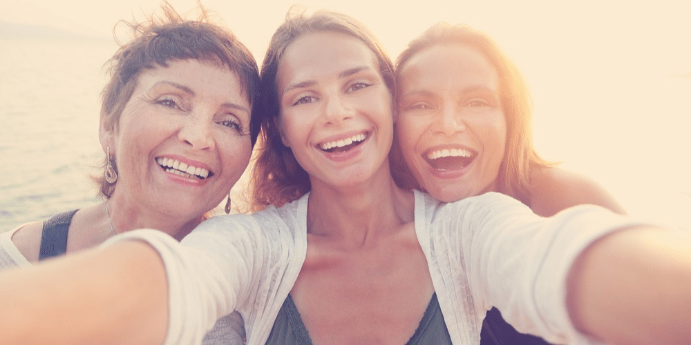 Image of three women with veneers